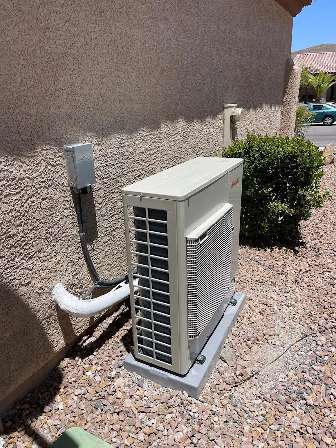 Residential air conditioning condenser unit in River Grove